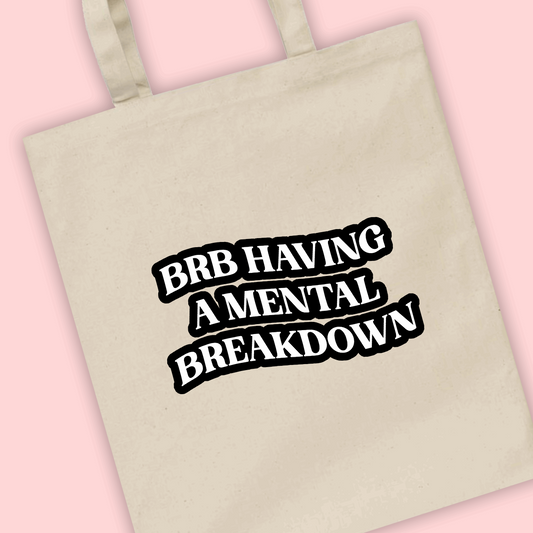 A natural tote bag with ‘brb having a mental breakdown’ written
