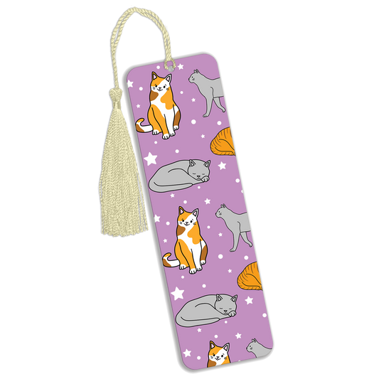 A purple metal bookmark with a repeated seamless pattern of cats
