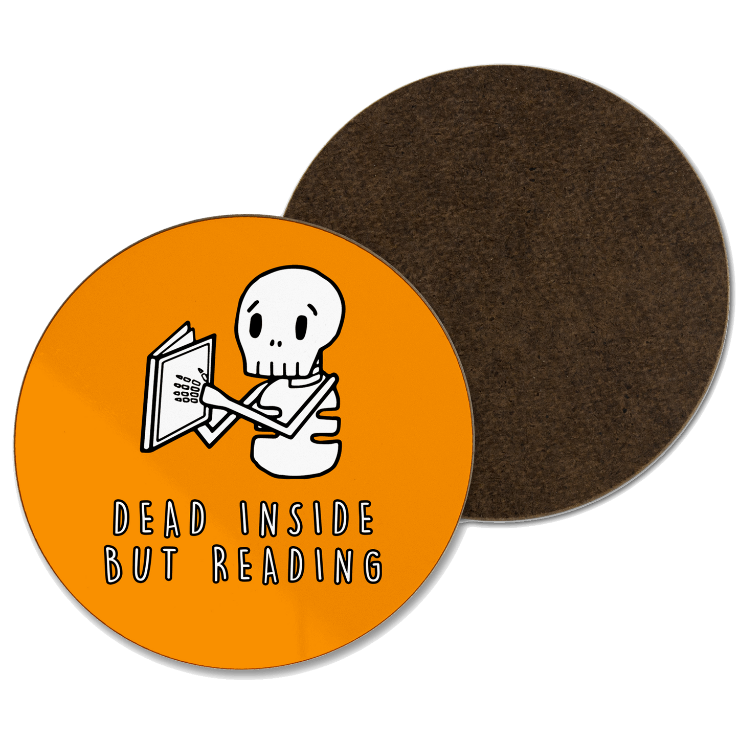 An orange coaster with ‘dead inside but reading’ written and a skeleton reading a book illustration