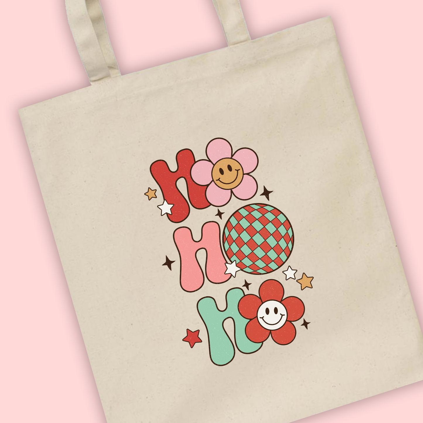 A natural tote bag with Ho Ho Ho written in a groovy disco print