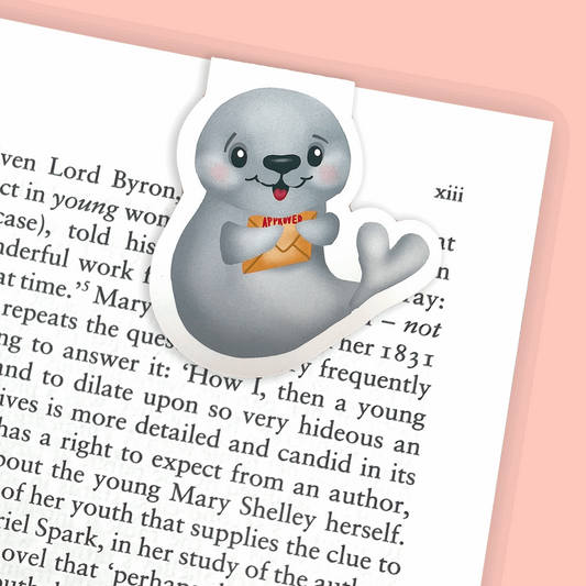 A magnetic bookmark featuring a seal illustration with a pun