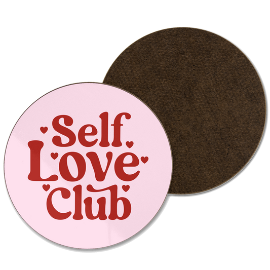 A pink coaster with self love club written in red