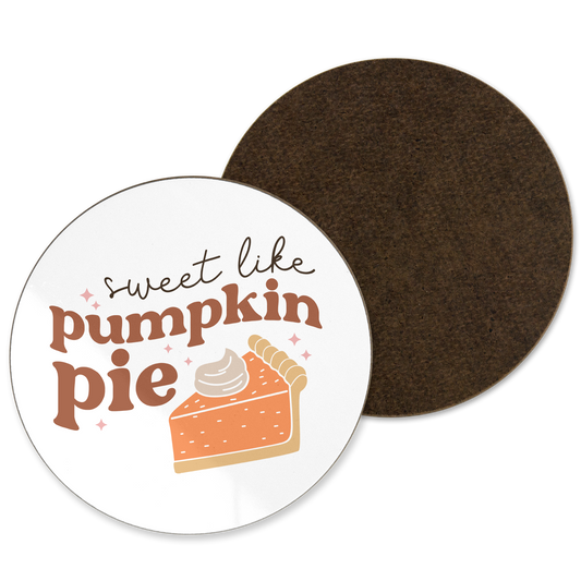 A white coaster with ‘sweet like pumpkin pie’ written with a pumpkin pie illustration 