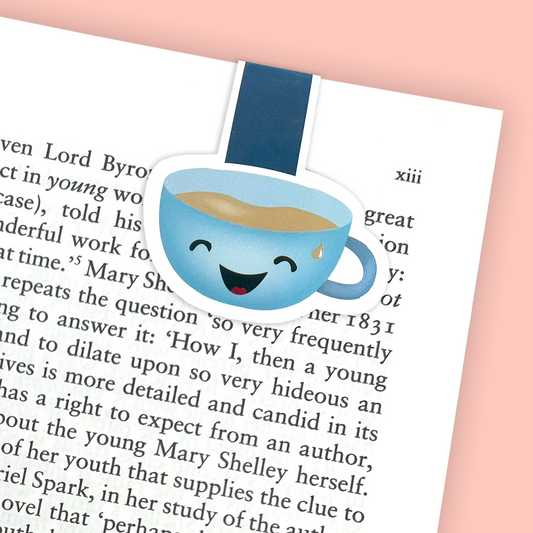 A magnetic bookmark featuring a teacup illustration